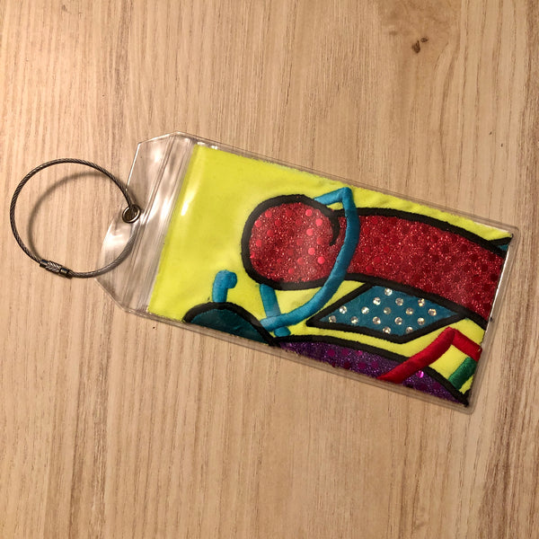 yellow multi luggage tags
