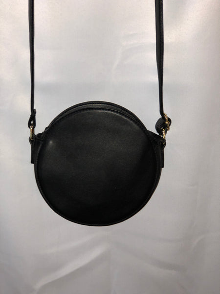 black round crossbody handbag