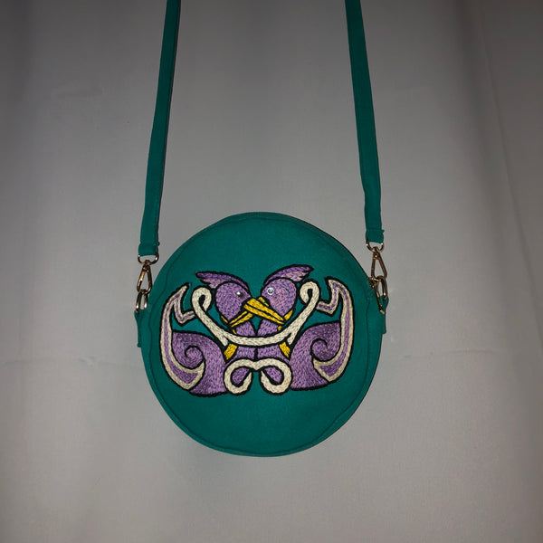 teal round crossbody/backpack