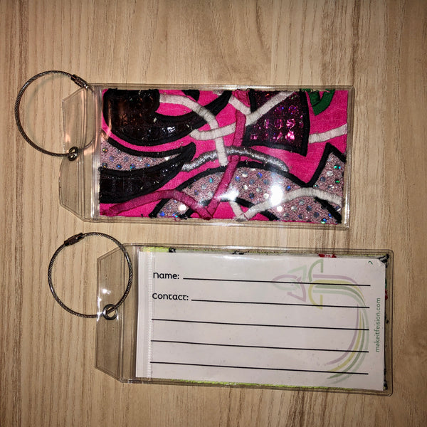 pink luggage tags
