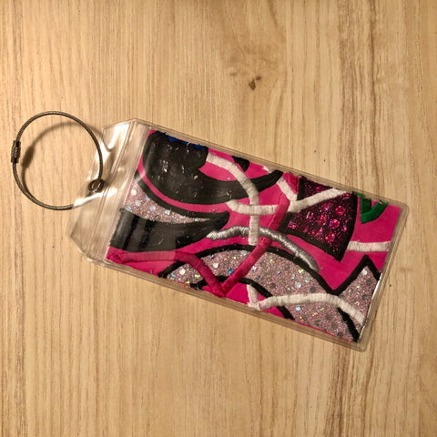 pink luggage tags
