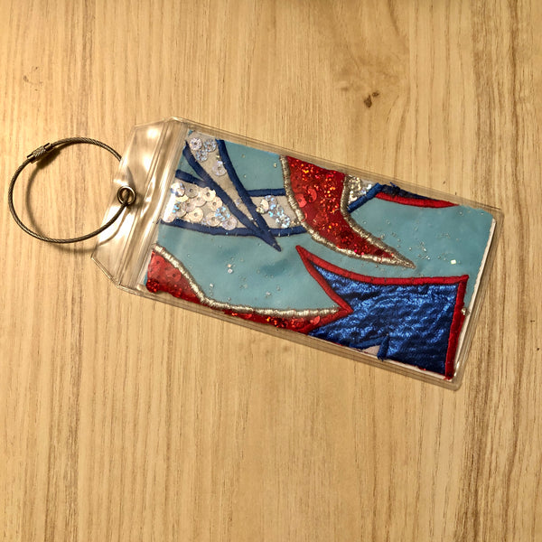 blue red luggage tags